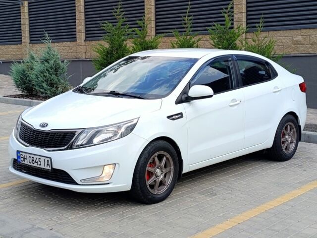 Белый Киа Рио, объемом двигателя 1.4 л и пробегом 99 тыс. км за 6517 $, фото 3 на Automoto.ua