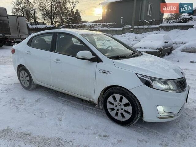 Білий Кіа Ріо, об'ємом двигуна 1.6 л та пробігом 196 тис. км за 7800 $, фото 1 на Automoto.ua