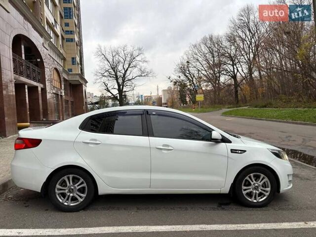 Білий Кіа Ріо, об'ємом двигуна 1.6 л та пробігом 91 тис. км за 8600 $, фото 8 на Automoto.ua