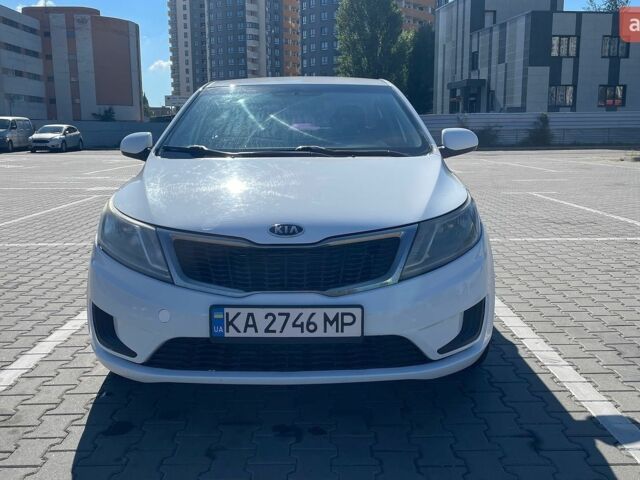 Белый Киа Рио, объемом двигателя 1.4 л и пробегом 228 тыс. км за 6700 $, фото 1 на Automoto.ua