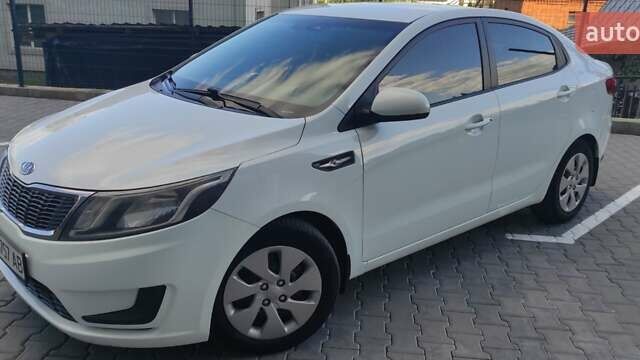 Білий Кіа Ріо, об'ємом двигуна 1.4 л та пробігом 168 тис. км за 7800 $, фото 6 на Automoto.ua