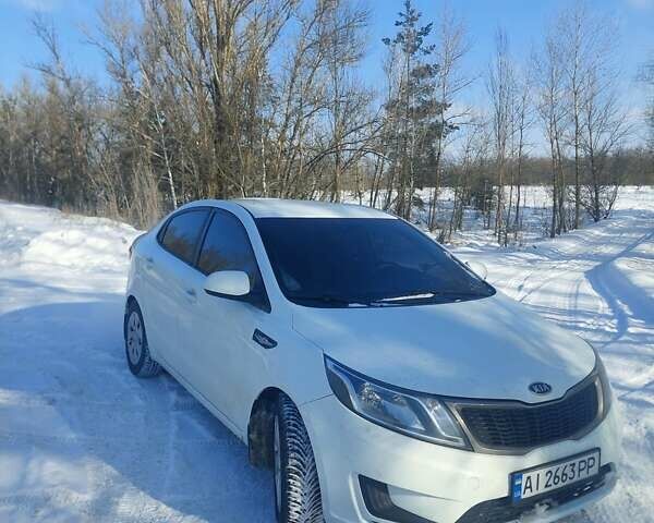 Білий Кіа Ріо, об'ємом двигуна 1.4 л та пробігом 266 тис. км за 6900 $, фото 1 на Automoto.ua