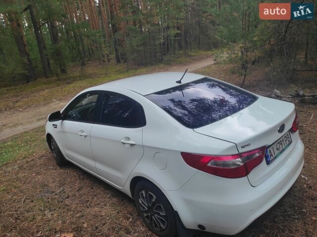 Белый Киа Рио, объемом двигателя 1.4 л и пробегом 253 тыс. км за 7050 $, фото 7 на Automoto.ua