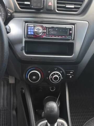 Белый Киа Рио, объемом двигателя 1.4 л и пробегом 168 тыс. км за 6800 $, фото 16 на Automoto.ua