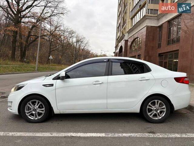 Білий Кіа Ріо, об'ємом двигуна 1.6 л та пробігом 91 тис. км за 8600 $, фото 16 на Automoto.ua