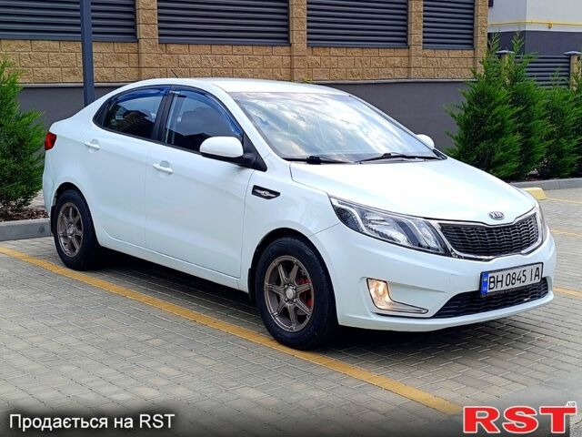 Білий Кіа Ріо, об'ємом двигуна 1.4 л та пробігом 99 тис. км за 6500 $, фото 4 на Automoto.ua