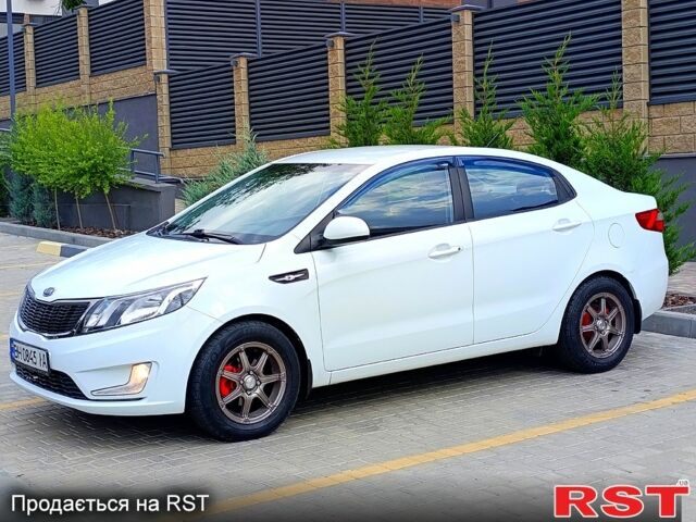 Білий Кіа Ріо, об'ємом двигуна 1.4 л та пробігом 99 тис. км за 6500 $, фото 5 на Automoto.ua