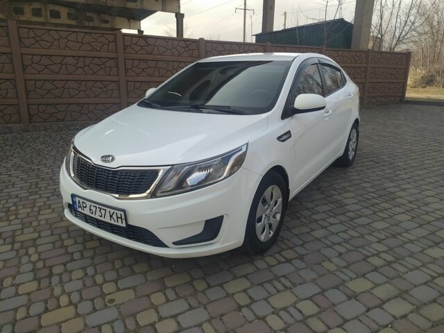 Білий Кіа Ріо, об'ємом двигуна 1.4 л та пробігом 158 тис. км за 6500 $, фото 12 на Automoto.ua