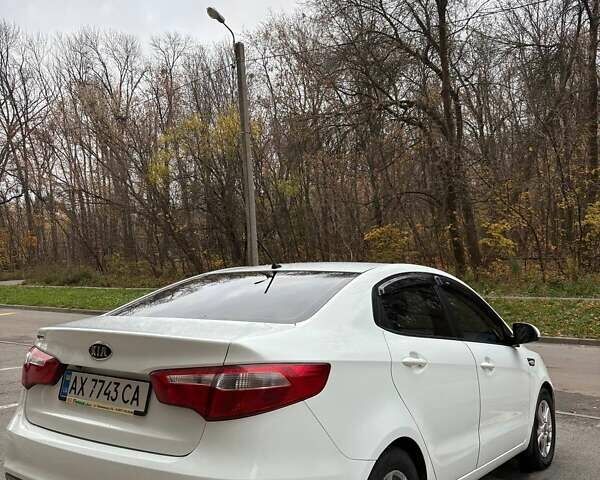 Білий Кіа Ріо, об'ємом двигуна 1.6 л та пробігом 91 тис. км за 8600 $, фото 5 на Automoto.ua