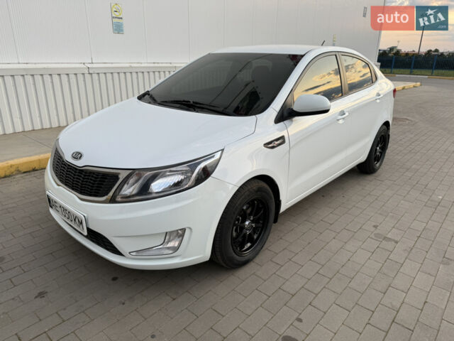 Білий Кіа Ріо, об'ємом двигуна 1.4 л та пробігом 96 тис. км за 8555 $, фото 16 на Automoto.ua