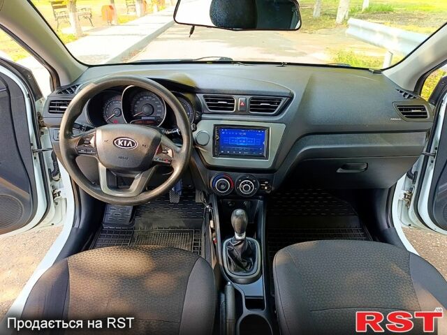 Білий Кіа Ріо, об'ємом двигуна 1.4 л та пробігом 99 тис. км за 6500 $, фото 9 на Automoto.ua