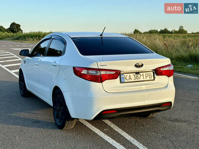 Білий Кіа Ріо, об'ємом двигуна 1.4 л та пробігом 142 тис. км за 6200 $, фото 15 на Automoto.ua