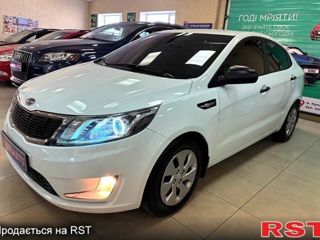 Белый Киа Рио, объемом двигателя 1.4 л и пробегом 167 тыс. км за 7500 $, фото 1 на Automoto.ua