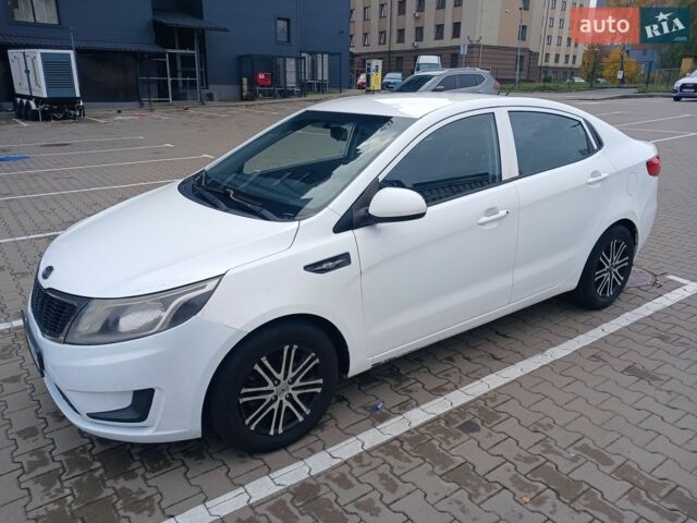Білий Кіа Ріо, об'ємом двигуна 1.4 л та пробігом 230 тис. км за 5300 $, фото 3 на Automoto.ua