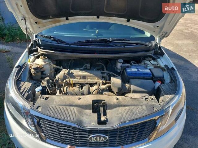 Білий Кіа Ріо, об'ємом двигуна 1.4 л та пробігом 69 тис. км за 8999 $, фото 17 на Automoto.ua