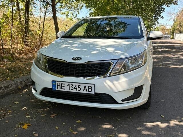 Белый Киа Рио, объемом двигателя 1.4 л и пробегом 131 тыс. км за 8499 $, фото 2 на Automoto.ua