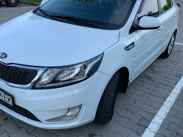 Білий Кіа Ріо, об'ємом двигуна 1.4 л та пробігом 175 тис. км за 6600 $, фото 8 на Automoto.ua