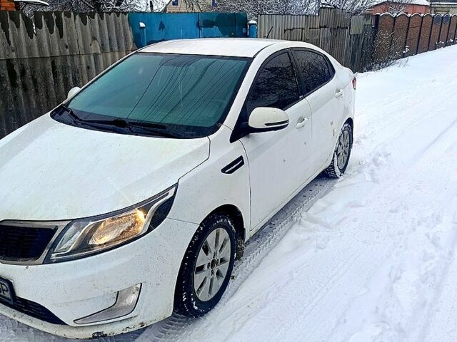 Белый Киа Рио, объемом двигателя 1.6 л и пробегом 168 тыс. км за 4999 $, фото 1 на Automoto.ua