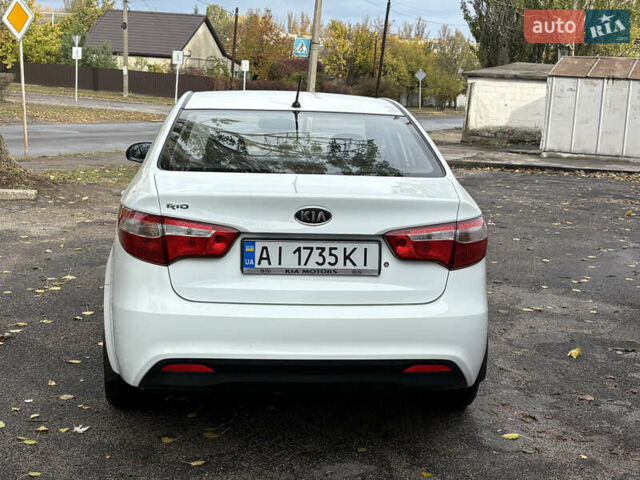 Кіа Ріо 2012 у Никополе на Automoto.ua Білий Кіа Ріо, об'ємом двигуна 1.4 л та пробігом 168 тис. км за 7500 $, фото 6 на Automoto.ua