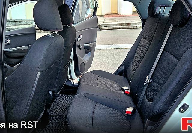 Белый Киа Рио, объемом двигателя 1.4 л и пробегом 105 тыс. км за 6300 $, фото 8 на Automoto.ua