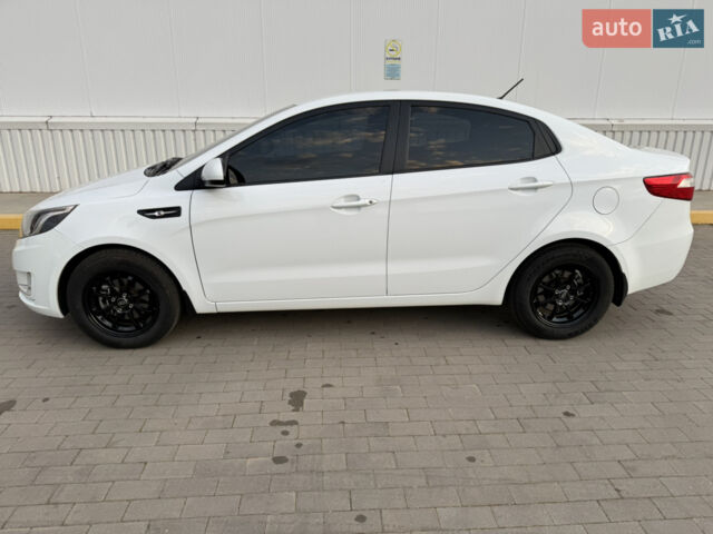 Білий Кіа Ріо, об'ємом двигуна 1.4 л та пробігом 96 тис. км за 8555 $, фото 17 на Automoto.ua