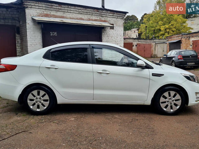 Белый Киа Рио, объемом двигателя 1.59 л и пробегом 159 тыс. км за 8800 $, фото 4 на Automoto.ua