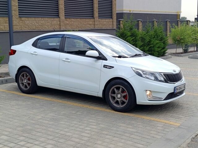 Белый Киа Рио, объемом двигателя 1.4 л и пробегом 99 тыс. км за 6517 $, фото 4 на Automoto.ua