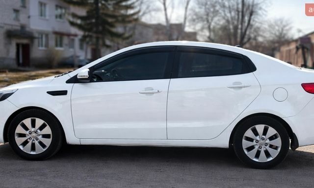 Білий Кіа Ріо, об'ємом двигуна 1.59 л та пробігом 221 тис. км за 6000 $, фото 7 на Automoto.ua