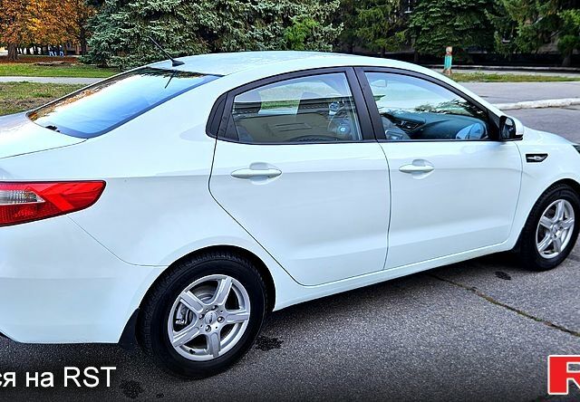 Белый Киа Рио, объемом двигателя 1.4 л и пробегом 105 тыс. км за 6300 $, фото 3 на Automoto.ua