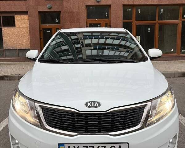 Білий Кіа Ріо, об'ємом двигуна 1.6 л та пробігом 91 тис. км за 8600 $, фото 1 на Automoto.ua