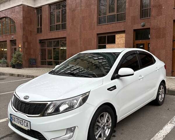 Білий Кіа Ріо, об'ємом двигуна 1.6 л та пробігом 91 тис. км за 8600 $, фото 6 на Automoto.ua