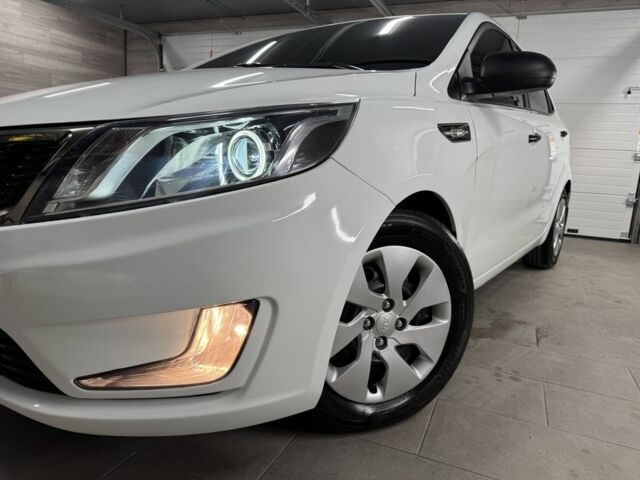 Белый Киа Рио, объемом двигателя 1.4 л и пробегом 167 тыс. км за 7500 $, фото 8 на Automoto.ua