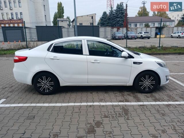 Білий Кіа Ріо, об'ємом двигуна 1.4 л та пробігом 230 тис. км за 5300 $, фото 7 на Automoto.ua