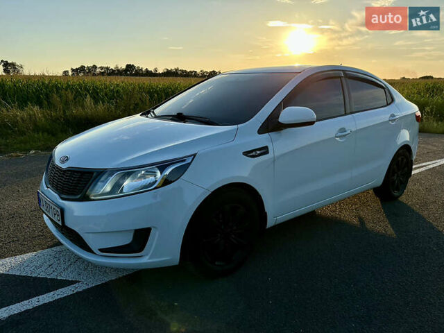 Білий Кіа Ріо, об'ємом двигуна 1.4 л та пробігом 142 тис. км за 6200 $, фото 8 на Automoto.ua