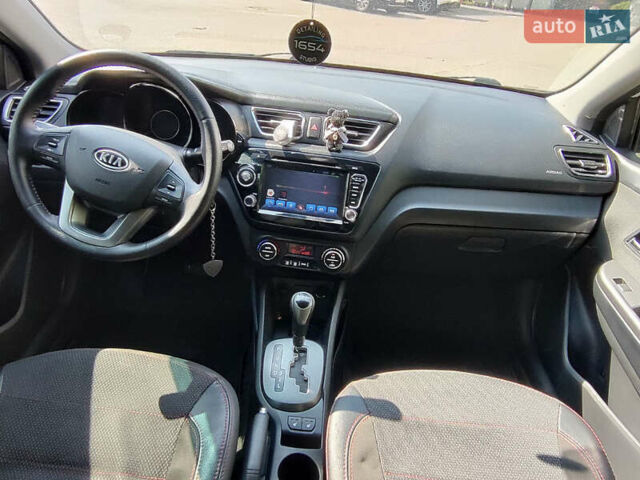 Білий Кіа Ріо, об'ємом двигуна 1.6 л та пробігом 206 тис. км за 6600 $, фото 16 на Automoto.ua