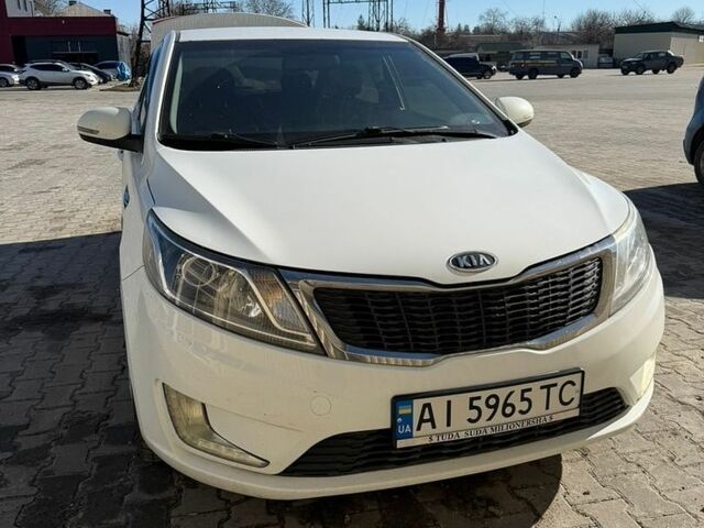 Білий Кіа Ріо, об'ємом двигуна 1.6 л та пробігом 235 тис. км за 7600 $, фото 2 на Automoto.ua