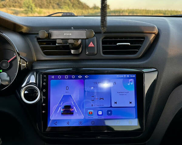 Білий Кіа Ріо, об'ємом двигуна 1.4 л та пробігом 142 тис. км за 6200 $, фото 33 на Automoto.ua