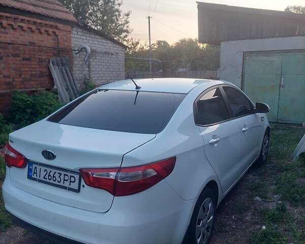 Білий Кіа Ріо, об'ємом двигуна 1.4 л та пробігом 266 тис. км за 6900 $, фото 4 на Automoto.ua