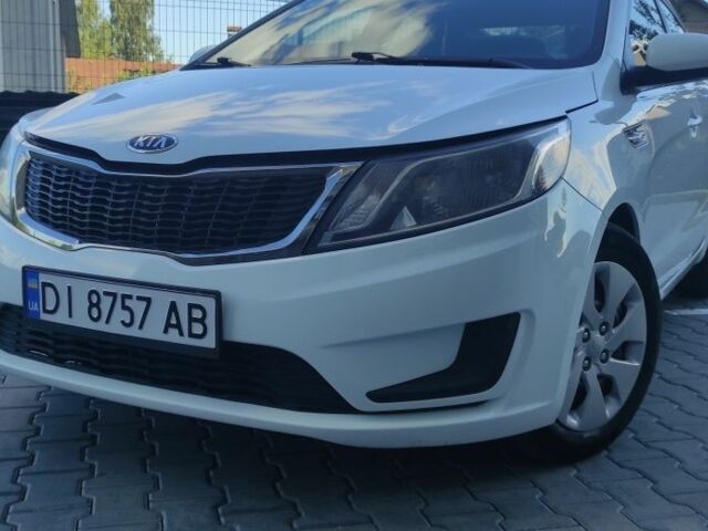 Белый Киа Рио, объемом двигателя 1.4 л и пробегом 170 тыс. км за 6700 $, фото 5 на Automoto.ua