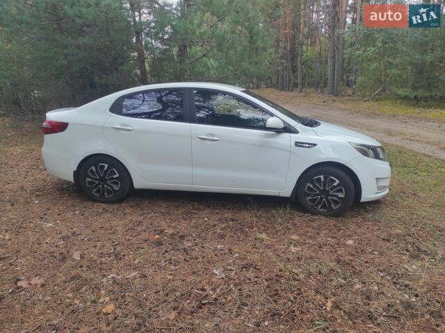 Белый Киа Рио, объемом двигателя 1.4 л и пробегом 253 тыс. км за 7050 $, фото 1 на Automoto.ua