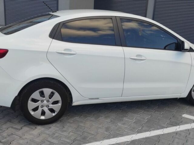 Білий Кіа Ріо, об'ємом двигуна 1.4 л та пробігом 168 тис. км за 6800 $, фото 2 на Automoto.ua