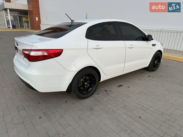Білий Кіа Ріо, об'ємом двигуна 1.4 л та пробігом 96 тис. км за 8555 $, фото 23 на Automoto.ua