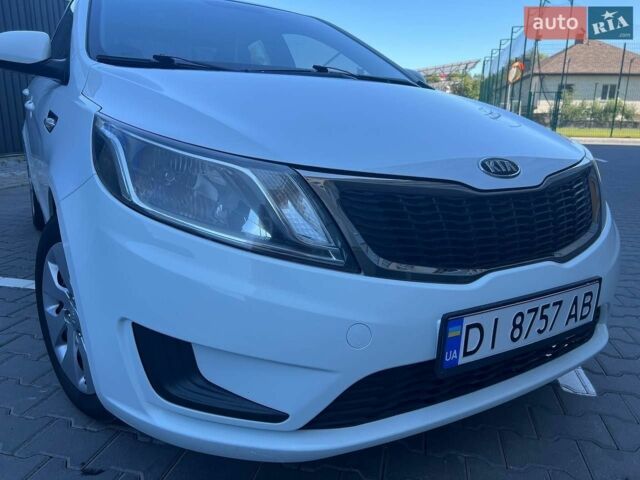 Білий Кіа Ріо, об'ємом двигуна 1.4 л та пробігом 171 тис. км за 6800 $, фото 12 на Automoto.ua
