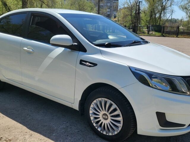 Белый Киа Рио, объемом двигателя 1.4 л и пробегом 235 тыс. км за 7700 $, фото 1 на Automoto.ua
