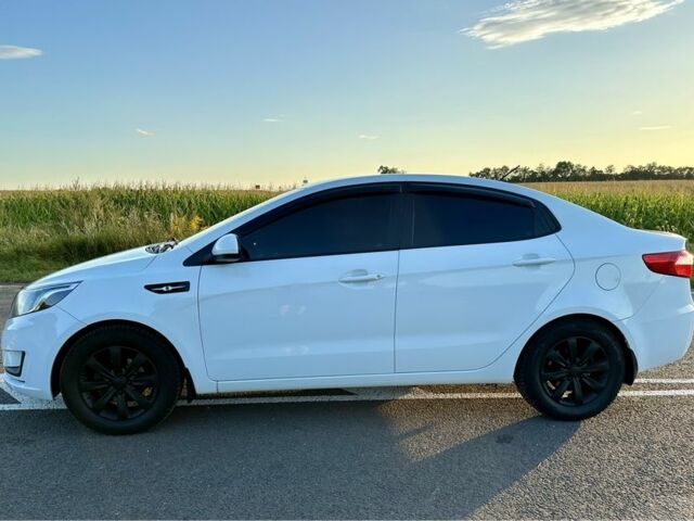 Білий Кіа Ріо, об'ємом двигуна 1.4 л та пробігом 142 тис. км за 6000 $, фото 5 на Automoto.ua