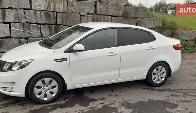Белый Киа Рио, объемом двигателя 1.4 л и пробегом 175 тыс. км за 6900 $, фото 6 на Automoto.ua