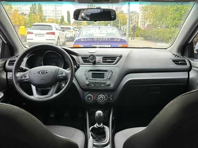 Білий Кіа Ріо, об'ємом двигуна 1.4 л та пробігом 118 тис. км за 6899 $, фото 6 на Automoto.ua
