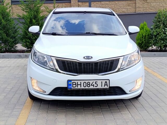 Белый Киа Рио, объемом двигателя 1.4 л и пробегом 99 тыс. км за 6517 $, фото 1 на Automoto.ua