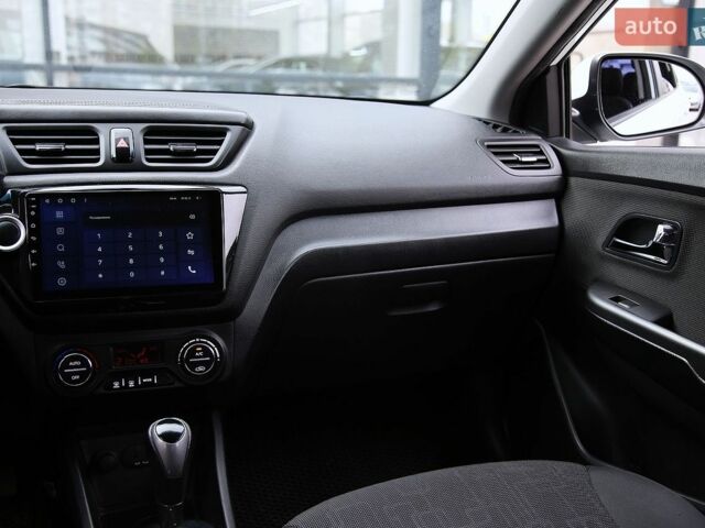 Білий Кіа Ріо, об'ємом двигуна 1.6 л та пробігом 127 тис. км за 8600 $, фото 12 на Automoto.ua