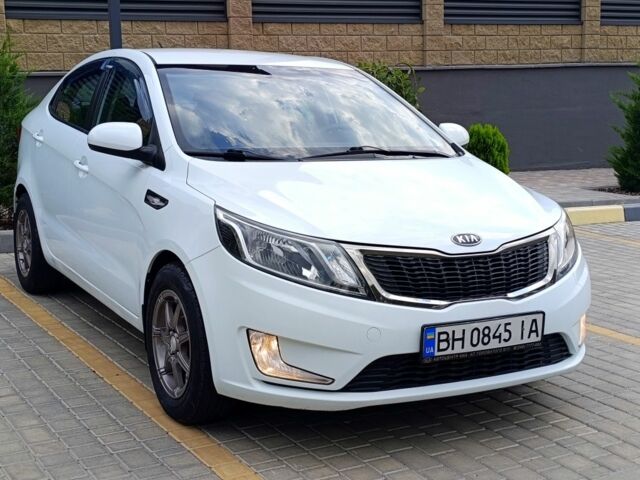 Белый Киа Рио, объемом двигателя 1.4 л и пробегом 99 тыс. км за 6517 $, фото 2 на Automoto.ua